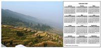 Calendrier 2025 annuel à imprimer, format paysage, une ligne par trimestre, à droite d'une photo